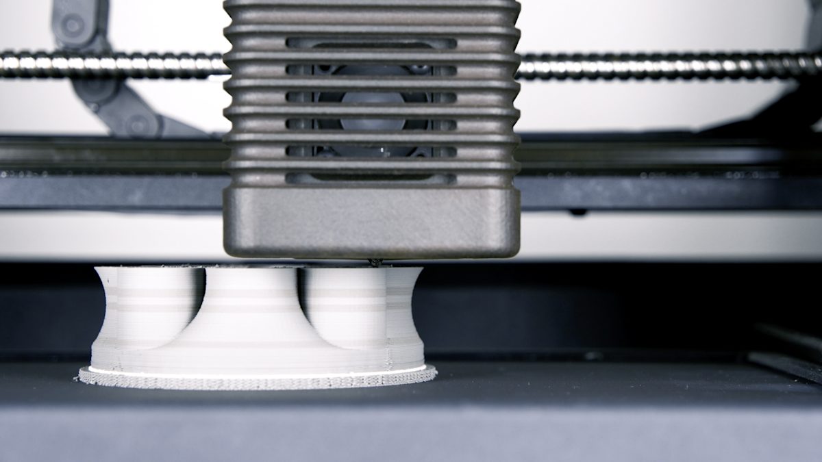 A Metal Extrusion 3D printer in action
